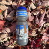 a blue and grey water bottle with a winter scene printed on it says Poultney on the top
