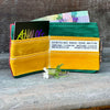 A colorful slim wallet in yellow, green and burgundy holds several cards and cash.