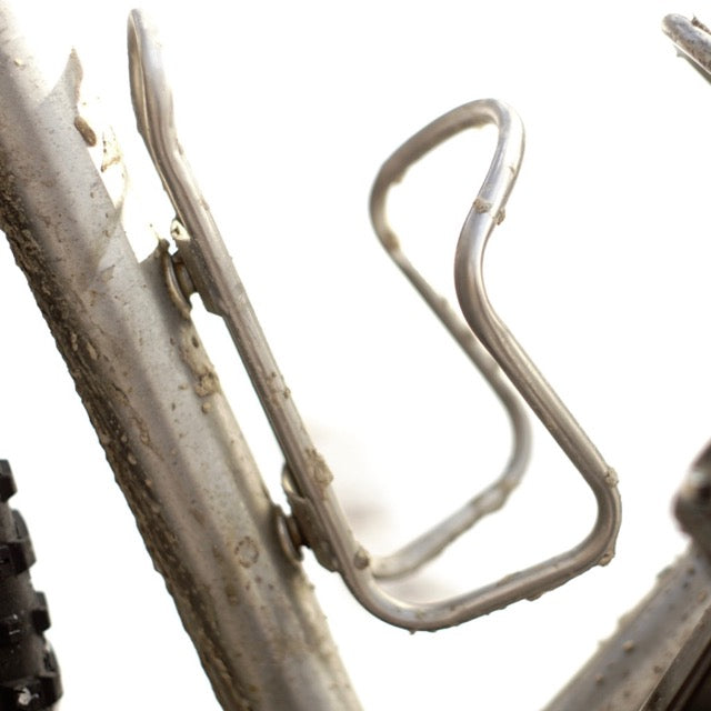 King Cage Raw Titanium Bottle Cage